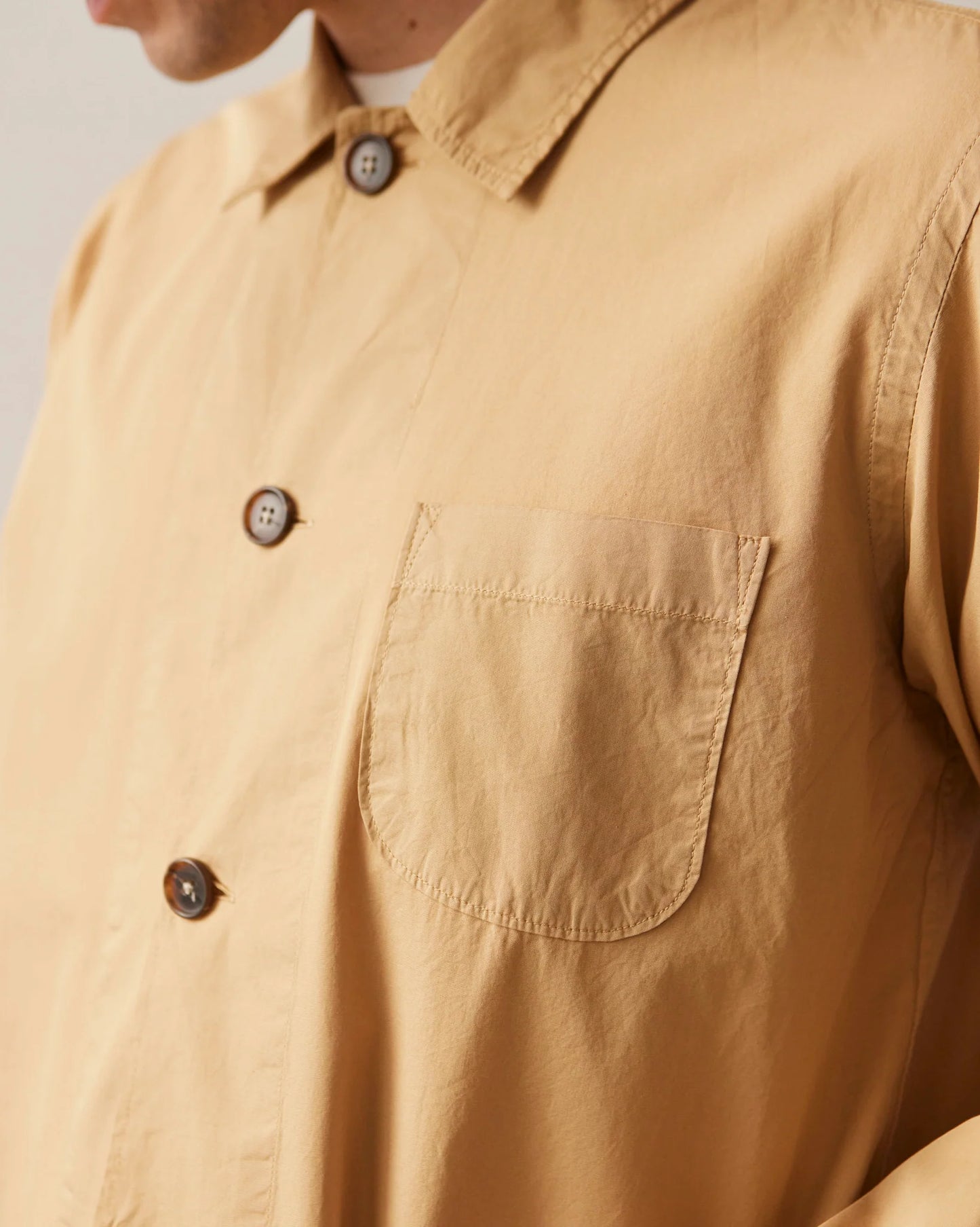 UNIVERSAL WORKS BAKER’S ORGANIC POPLIN OVERSHIRT IN SAND