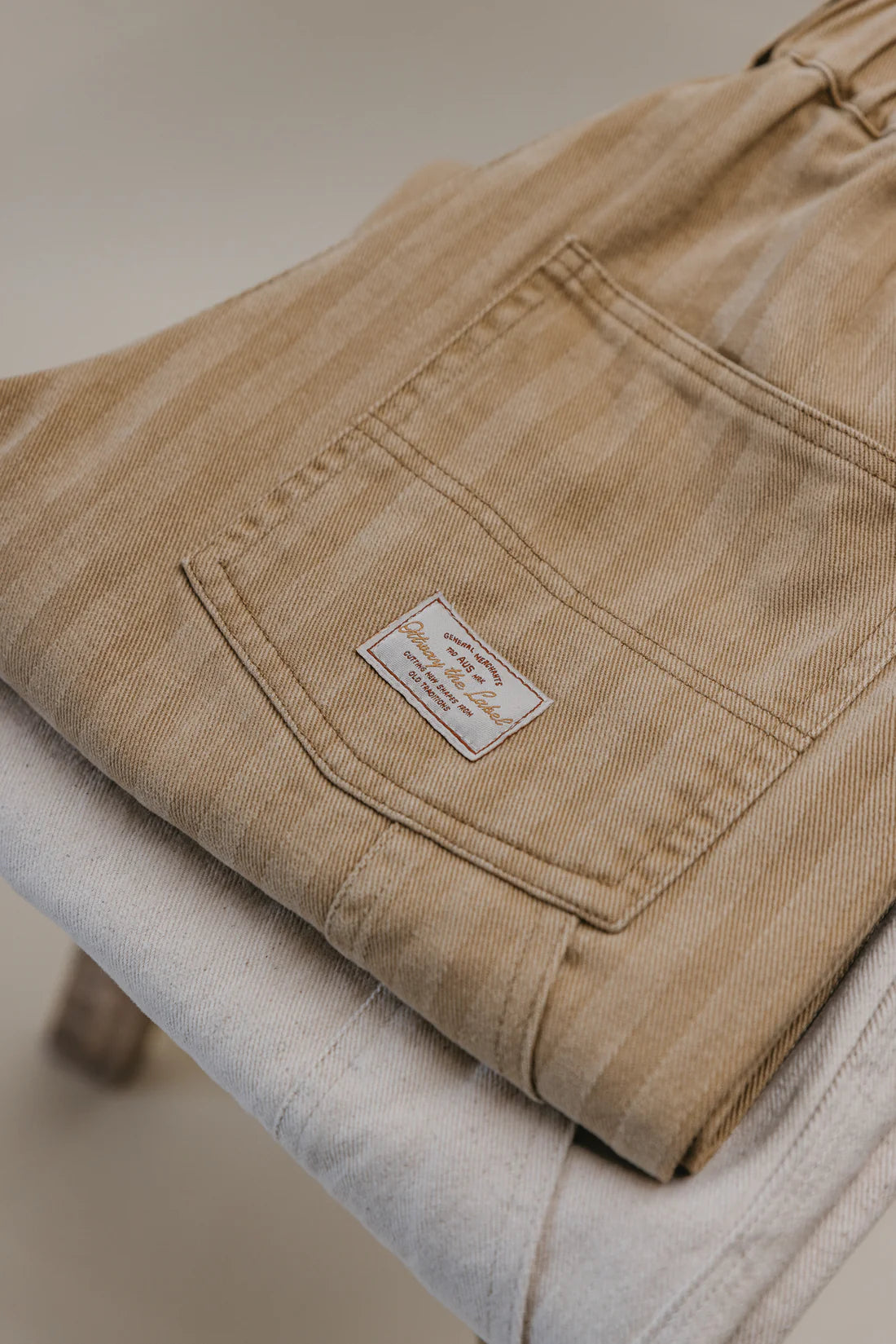 OTTWAY THE LABEL BEN ROY BAGGY PLEATED PANTS IN LIGHT BROWN